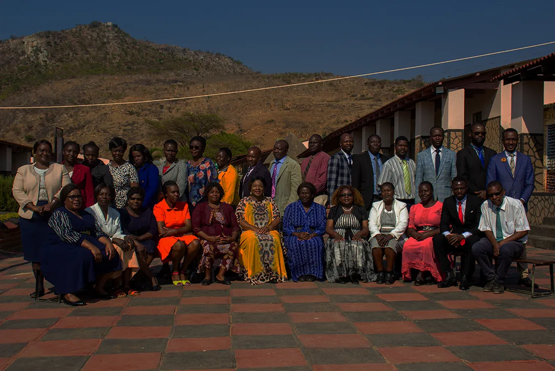 Nyamhuka staff with the Nyanga mountains behind